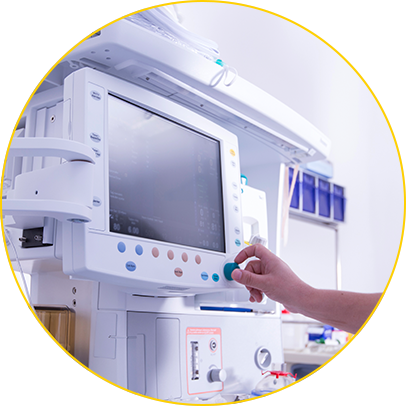 Hand adjusting a hospital device monitor